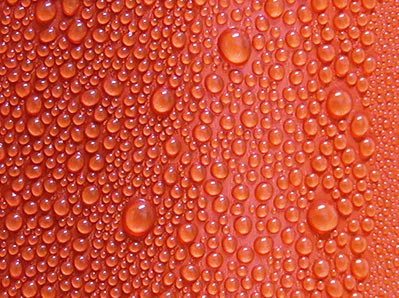 Water Condensation on red surface