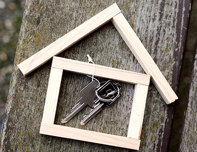 Keys in wooden house knick-knack