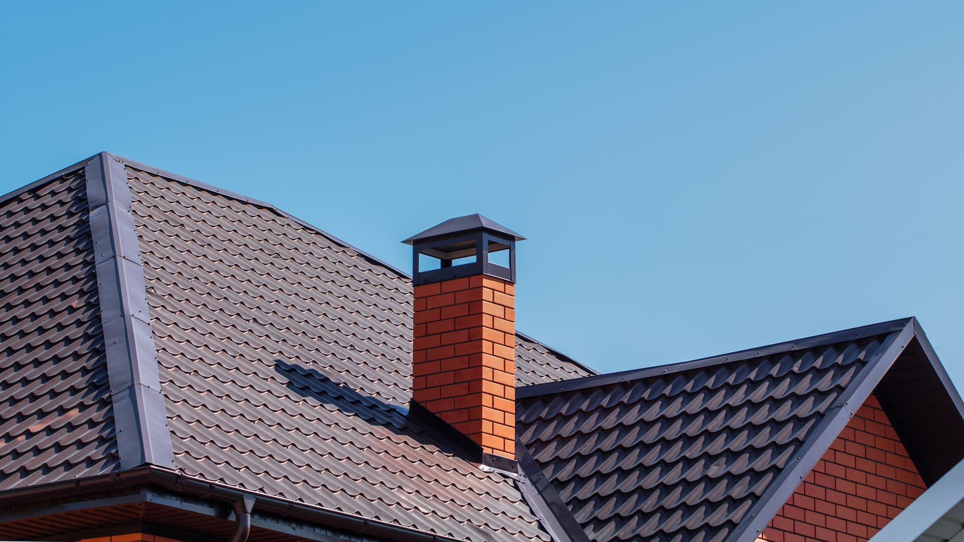A freshly installed, custom chimney on a new home.